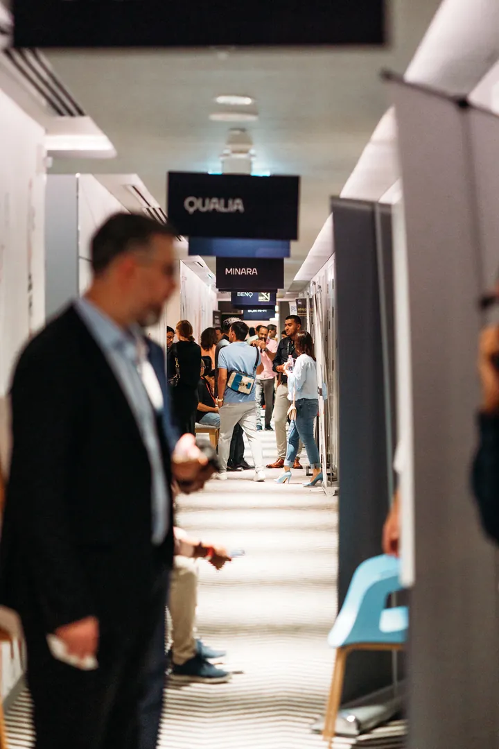 Visitors along the corridor of listening rooms