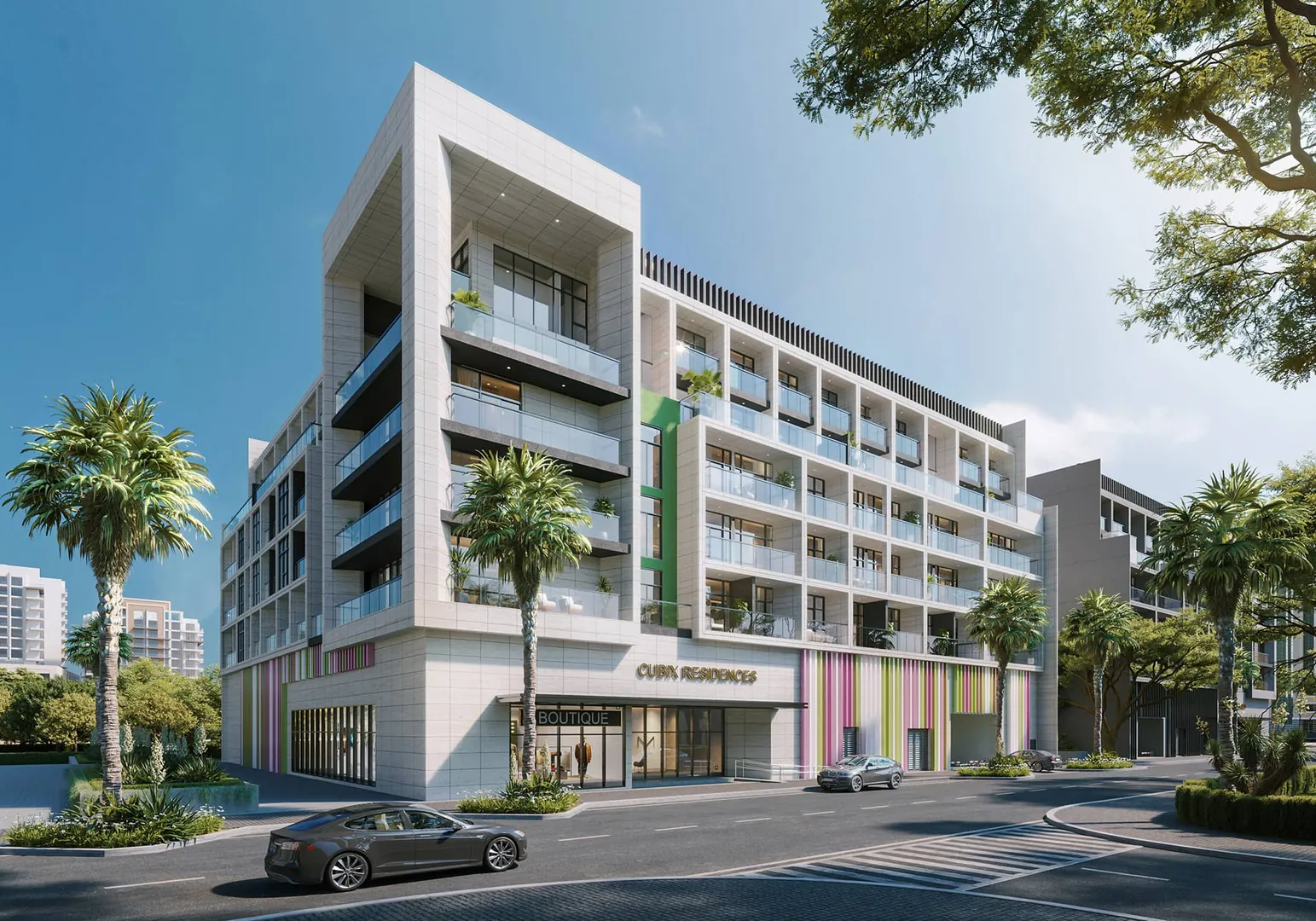 A QUBE residential building on a tree-lined street