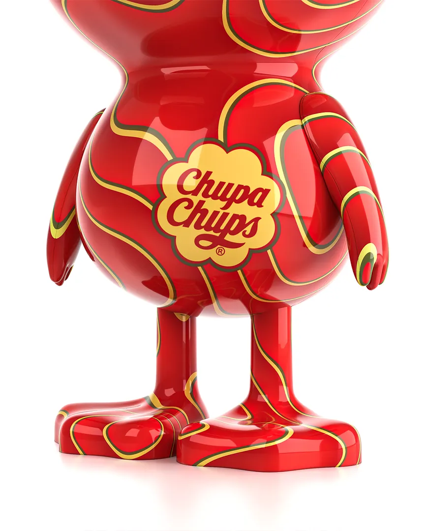 A close view of the red figure and the Chupa Chups logo