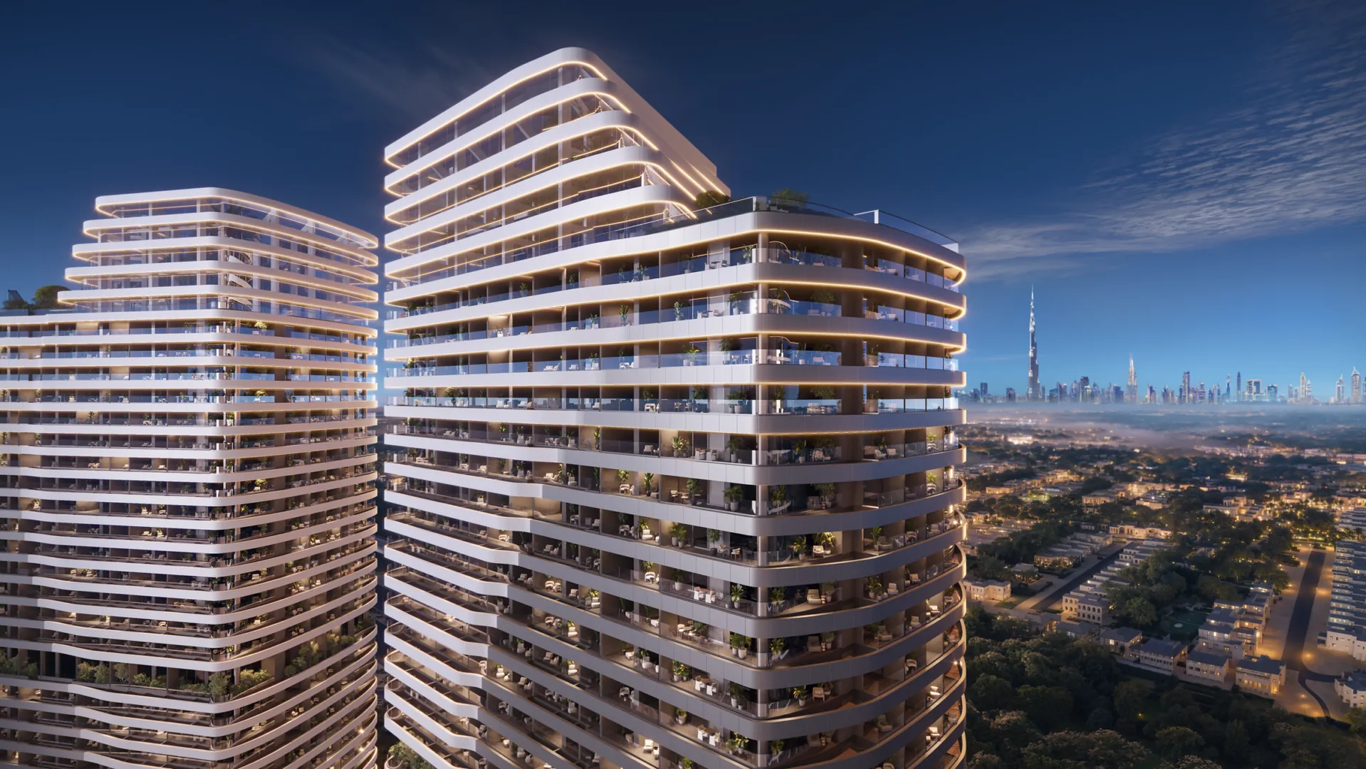 Two curved towers with the city beyond